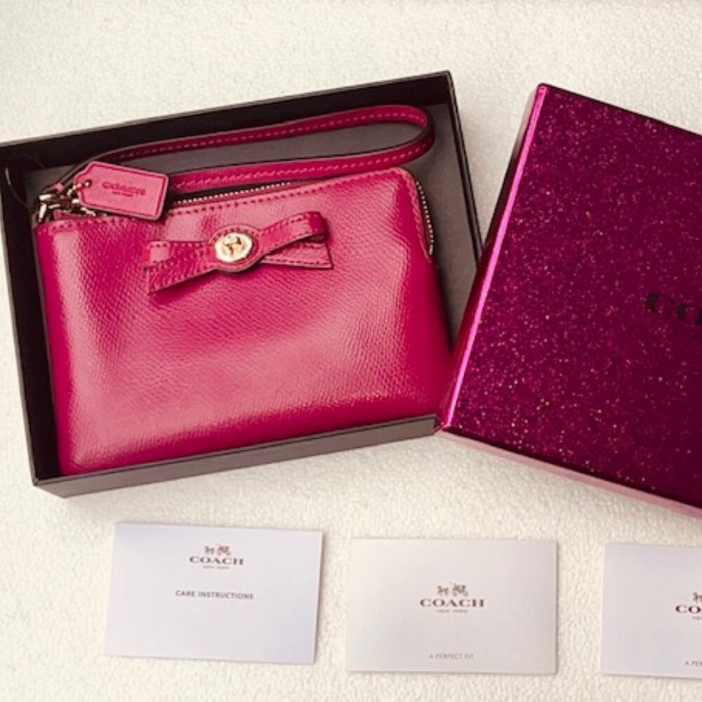 Coach Cranberry Turnlock Bow Wristlet